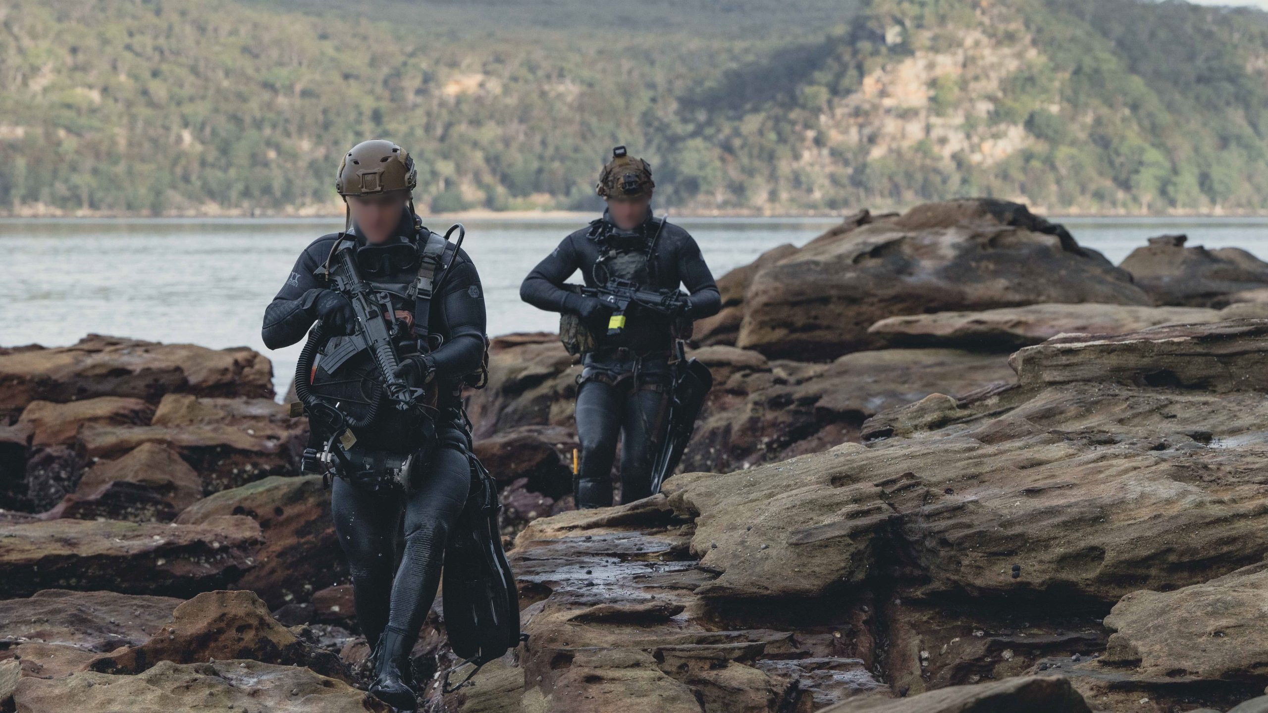 U.S. Naval Special Warfare operators and Marine Raiders conduct over-the-beach training during Exercise Talisman Sabre 25 in Sydney, Australia — the type of maritime SOF mission that SOCOM's ANCHOR Initiative seeks to upgrade with drone, AI and directed energy technologies