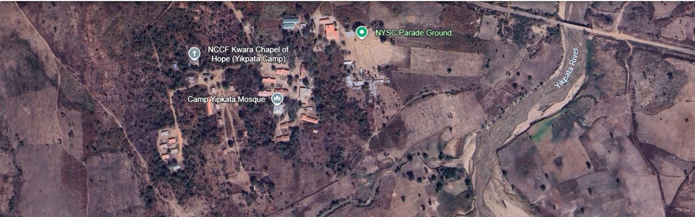 Google Earth zoomed satellite view of Yikpata NYSC camp — NYSC Parade Ground, Admin Hall and Camp Mosque labelled. Imagery 03/12/2024. Camera: 8deg49min40.13sec N 5deg05min05.45sec E