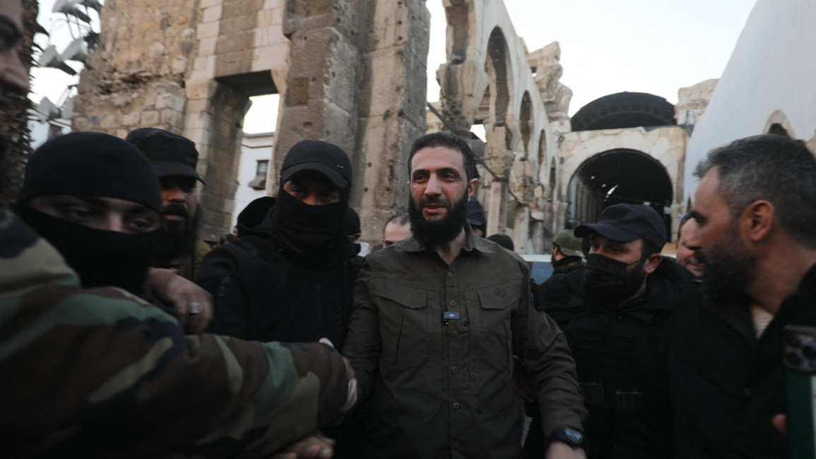 Foreign fighters who joined HTS in Syria, celebrating after the fall of the Assad regime in December 2024. Getty Images.