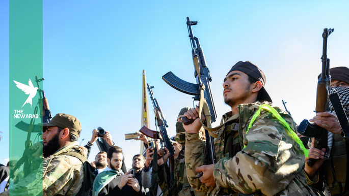 Foreign fighters in Idlib, Syria, 2026, showing armed muhajirin contingents in northwest Syria. Getty Images.